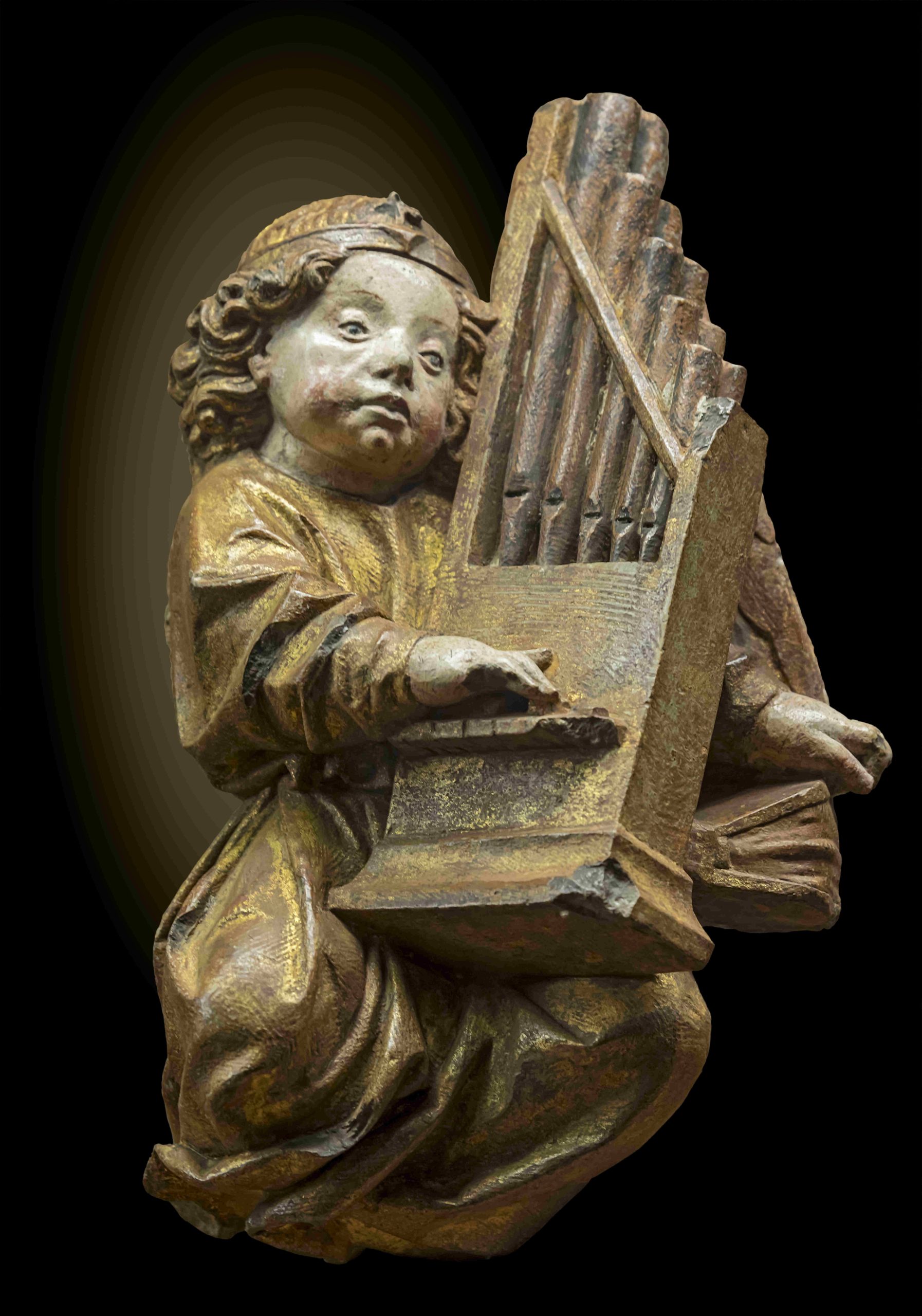 Statuetta policroma di un angelo che suona l’organo